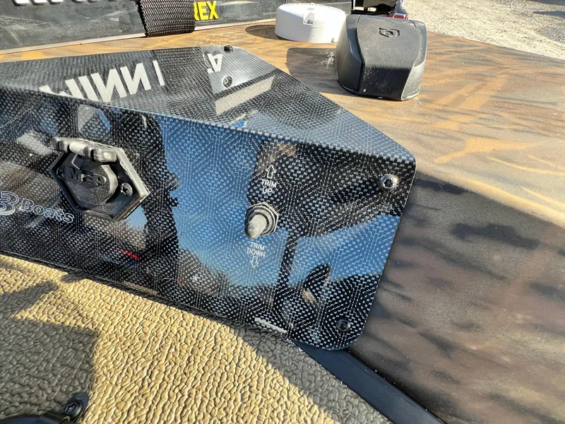 Slide: The Image of Close-up of 2024 G3 Sportsman 1710 VYL boat control panel. - 13