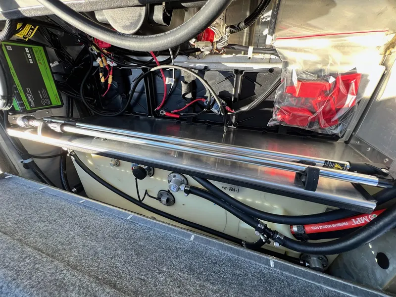 Slide: The Image of 2024 G3 Sportsman 1710 VYL boat interior wiring and battery compartment. - 26