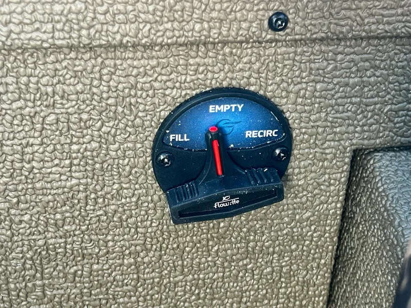 Slide: The Image of 2024 G3 Sportsman 1710 VYL boat control panel with fill, empty, and recirculate options. - 27