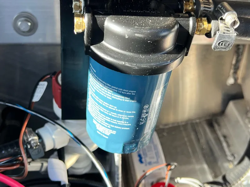 Slide: The Image of Close-up of a filter system in a 2024 G3 Sportsman 1710 VYL boat. - 29