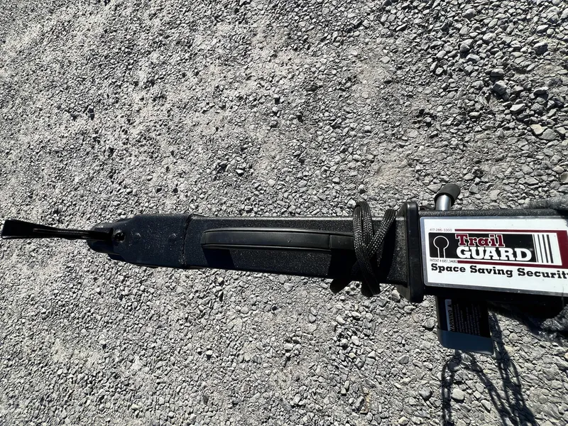 Slide: The Image of 2024 G3 Sportsman 1710 VYL with Trail Guard security system on gravel surface. - 39