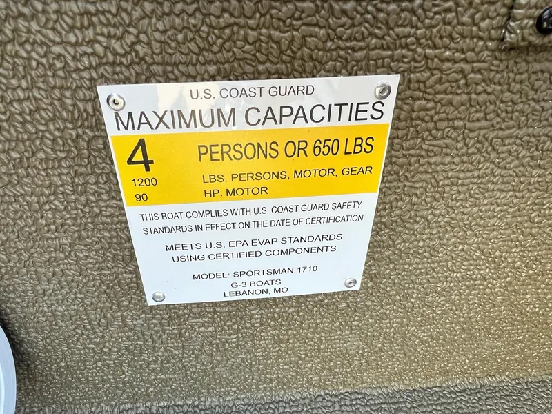 Slide: The Image of 2024 G3 Sportsman 1710 VYL boat capacity label, 4 persons or 650 lbs, 90 HP motor. - 40