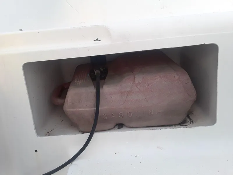Slide: The Image of Gasoline tank compartment on a 1996 MacGregor 26 "X" sailboat. - 19