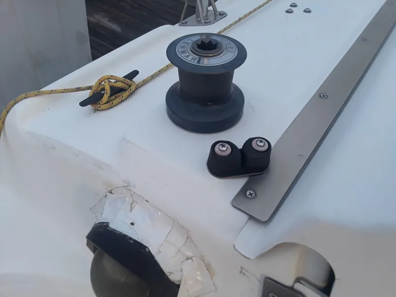 Slide: The Image of Winch and cleat on 1996 MacGregor 26 "X" sailboat deck. - 25