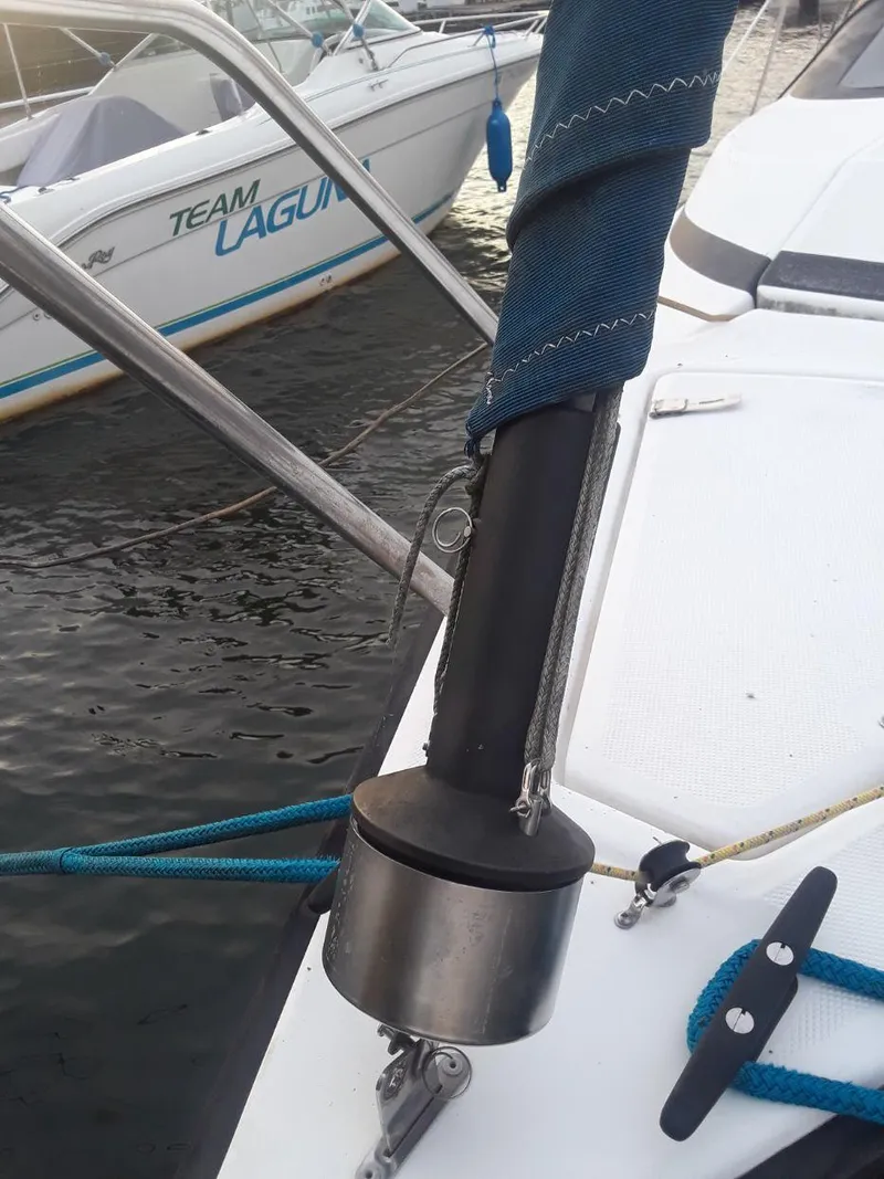 Slide: The Image of Sailboat mast detail on a 1996 MacGregor 26 "X" at a marina. - 8