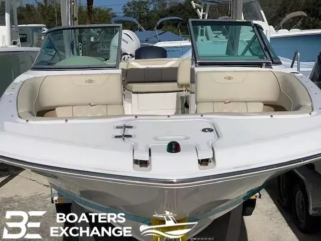 Slide: The Image of 2018 Regal OBX boat with open bow seating, displayed at Boaters Exchange. - 10