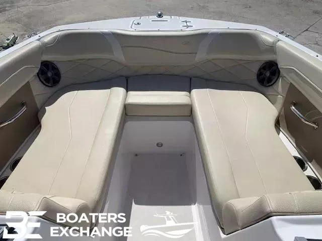 Slide: The Image of Interior of a 2018 Regal OBX boat with beige seating and speakers. - 9