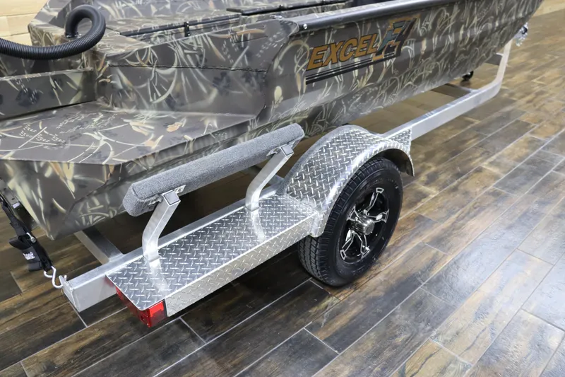 Slide: The Image of 2024 Excel 1651 Viper boat on a diamond plate trailer with camouflage design. - 12