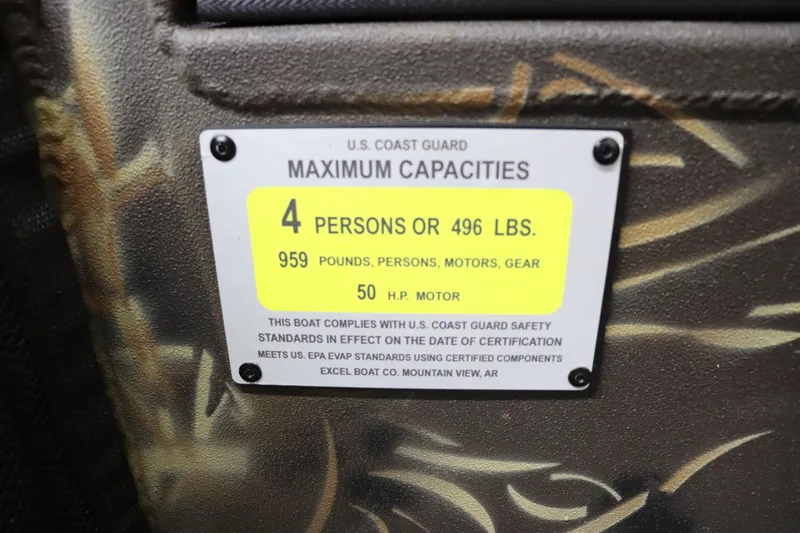 Slide: The Image of 2024 Excel 1651 Viper boat capacity label: 4 persons or 496 lbs, 50 HP motor. - 18