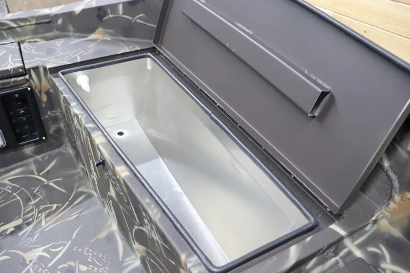 Slide: The Image of 2024 Excel 1651 Viper boat with open storage compartment. - 22