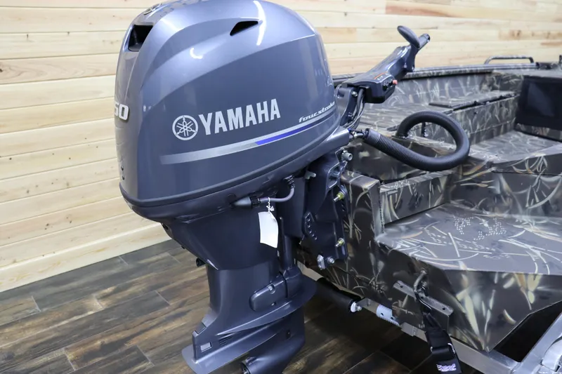 Slide: The Image of 2024 Excel 1651 Viper boat with Yamaha outboard motor in camo design. - 7