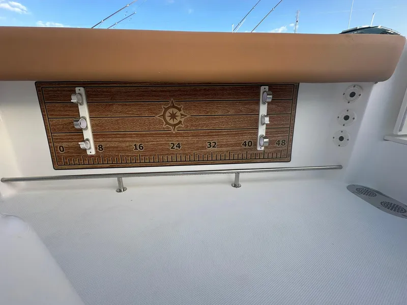 Slide: The Image of 2024 NauticStar 292 Legacy boat with a built-in fish measuring board. - 40