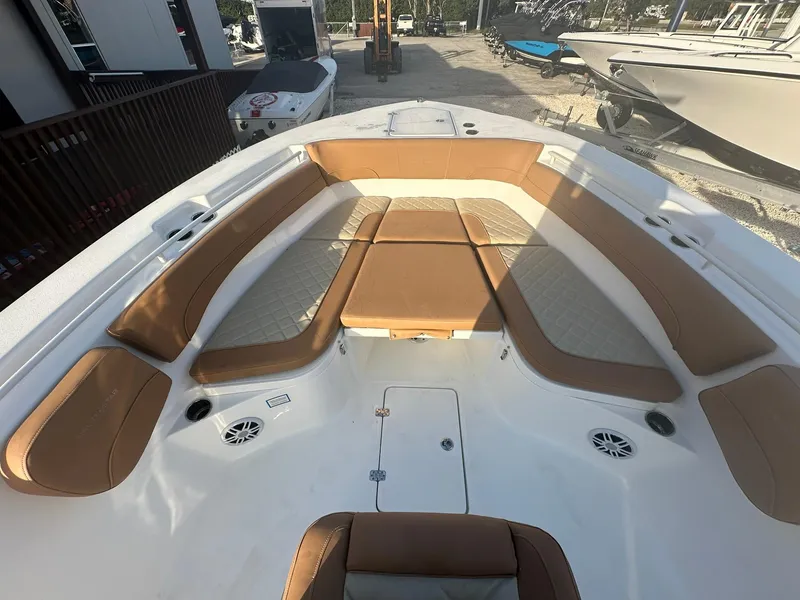 Slide: The Image of 2024 NauticStar 292 Legacy boat with spacious seating and modern design. - 5