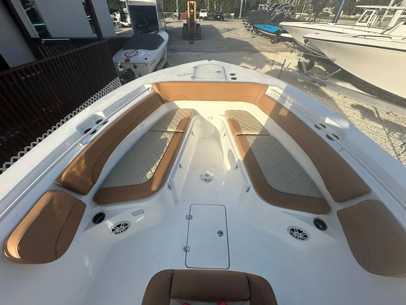 Slide: The Image of 2024 NauticStar 292 Legacy boat with spacious seating and modern design. - 6