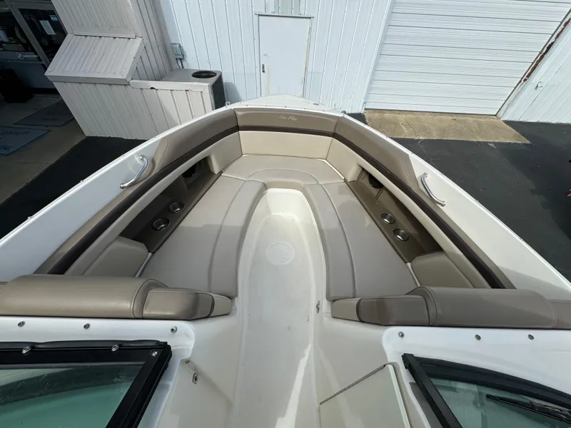 Slide: The Image of 2013 Sea Ray 250 SLX boat with spacious bow seating area. - 14