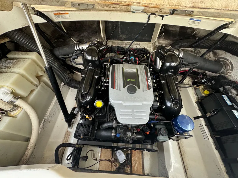 Slide: The Image of Engine compartment of a 2013 Sea Ray 250 SLX boat. - 15