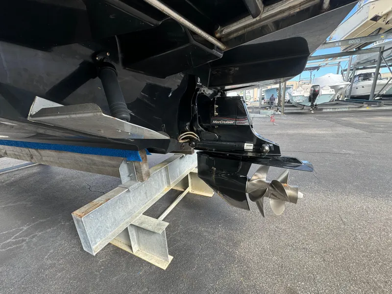 Slide: The Image of Close-up of 2013 Sea Ray 250 SLX boat propeller and stern drive. - 3