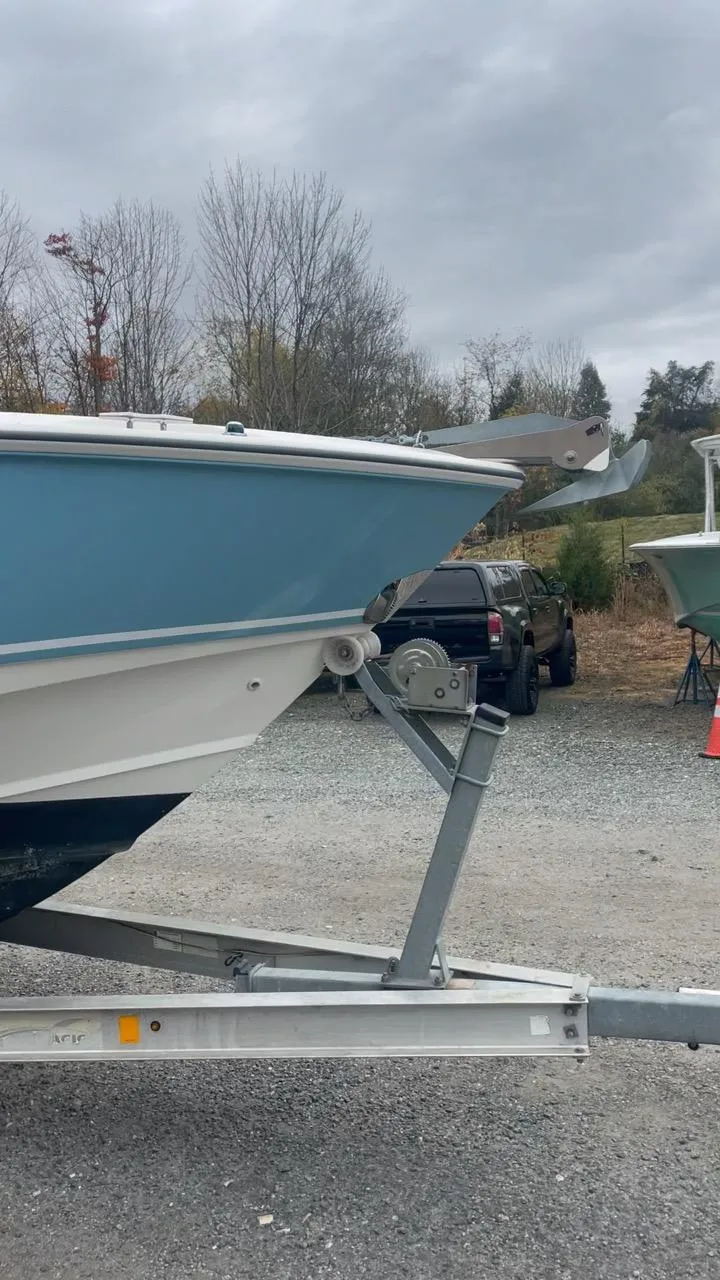 Slide: The Image of 2005 Boston Whaler Outrage 240 on trailer, side view. - 12