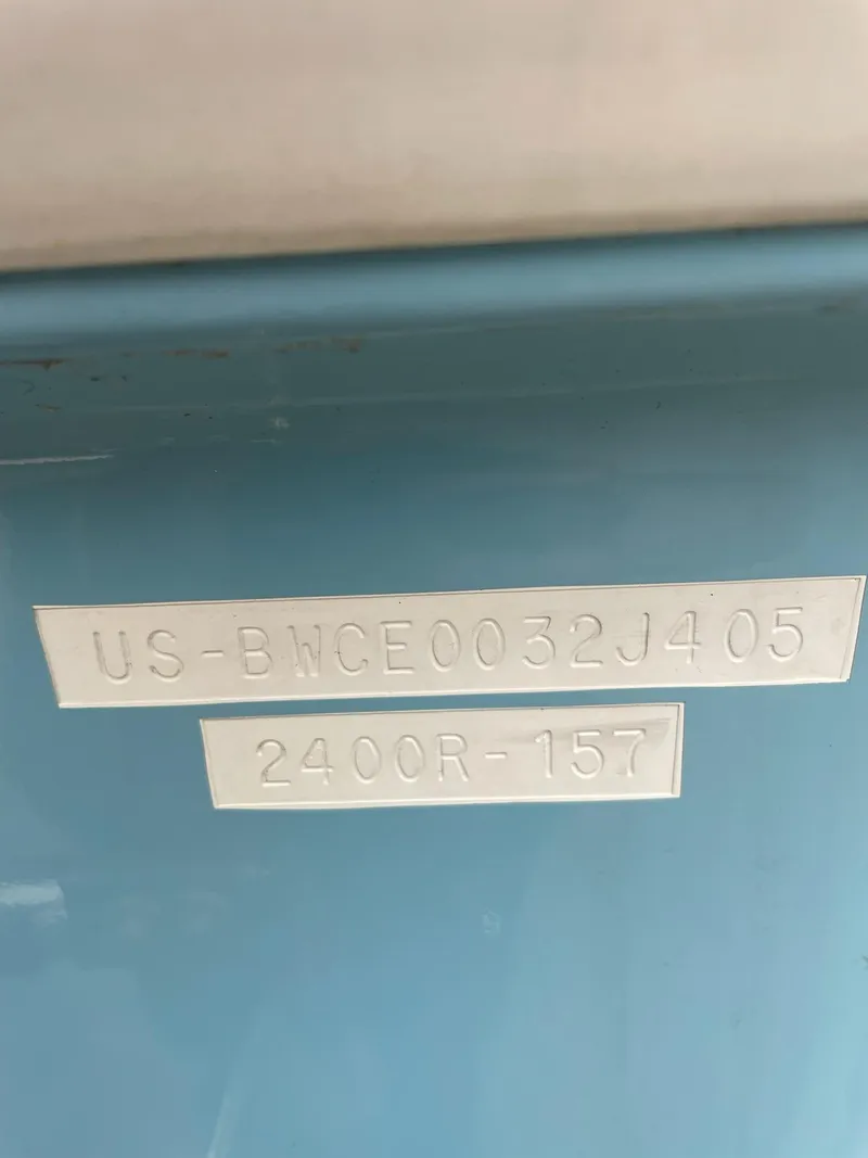 Slide: The Image of Serial number on a 2005 Boston Whaler Outrage 240 boat. - 22