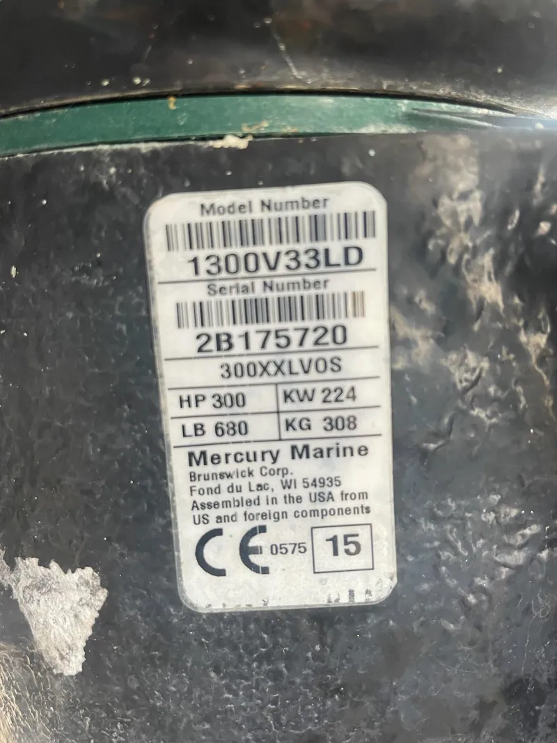 Slide: The Image of Label showing model and serial number of a Mercury Marine engine. - 23