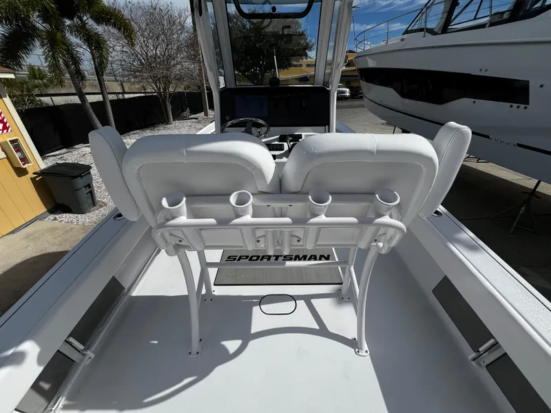 Slide: The Image of 2024 Sportsman Masters 247OE Bay Boat interior with dual seats and console. - 11