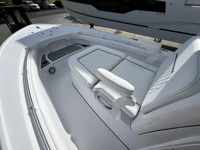 Slide: The Image of 2024 Sportsman Masters 247OE Bay Boat with luxurious seating and modern design. - 21