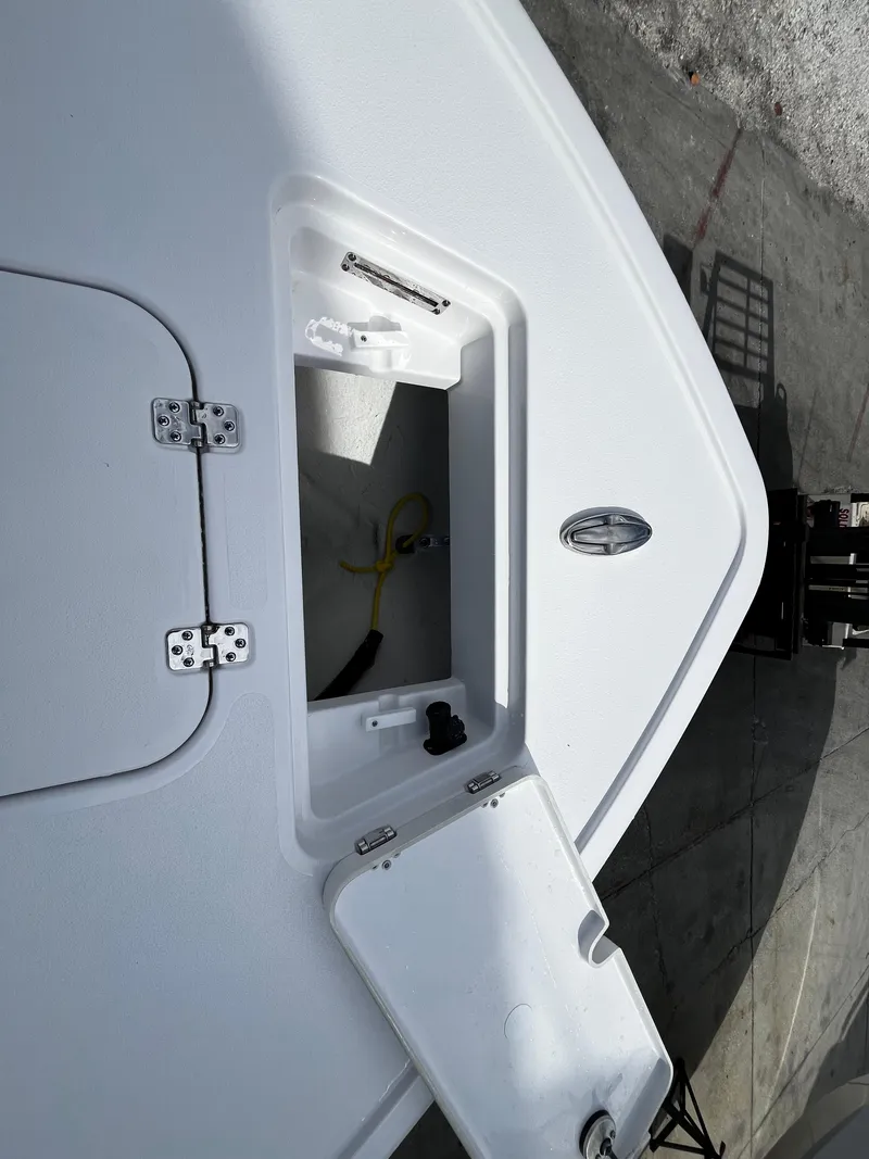 Slide: The Image of 2024 Sportsman Masters 247OE Bay Boat storage compartment. - 24