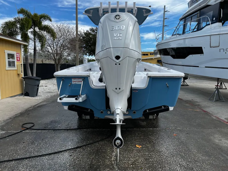 Slide: The Image of 2024 Sportsman Masters 247OE Bay Boat with Yamaha 300 V6 engine, rear view. - 3