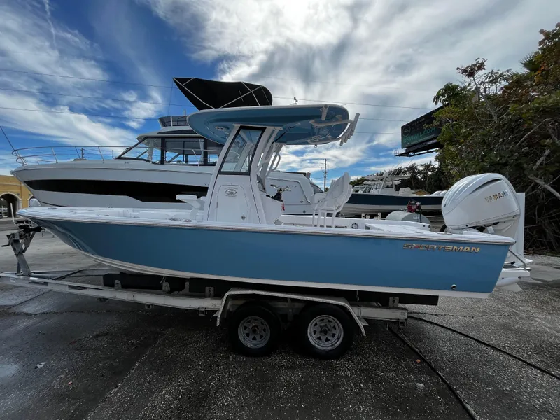 Slide: The Image of 2024 Sportsman Masters 247OE Bay Boat on trailer, side view. - 5