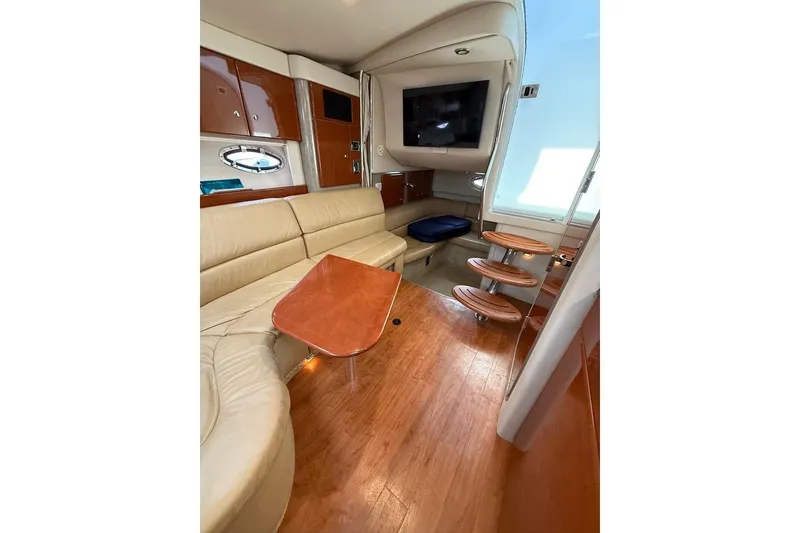 Slide: The Image of Luxurious interior of 2009 Formula 31 Performance Cruiser with leather seating and wooden accents. - 14