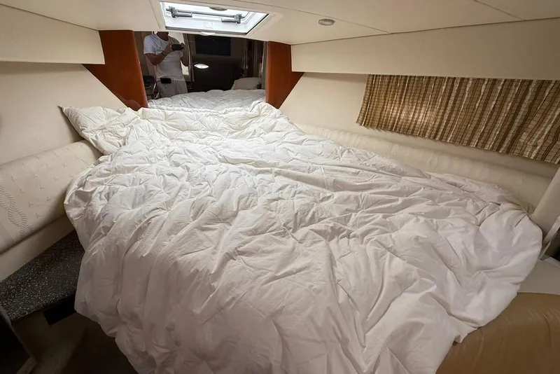 Slide: The Image of Interior cabin of 2009 Formula 31 Performance Cruiser with cozy bed and window. - 16
