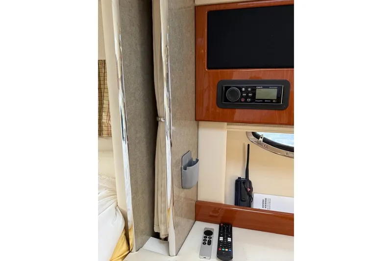 Slide: The Image of Interior of 2009 Formula 31 Performance Cruiser with radio, remote controls, and window. - 19