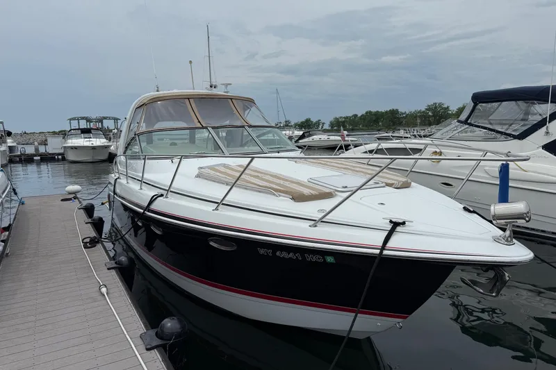 Slide: The Image of 2009 Formula 31 Performance Cruiser docked at marina, overcast sky. - 23