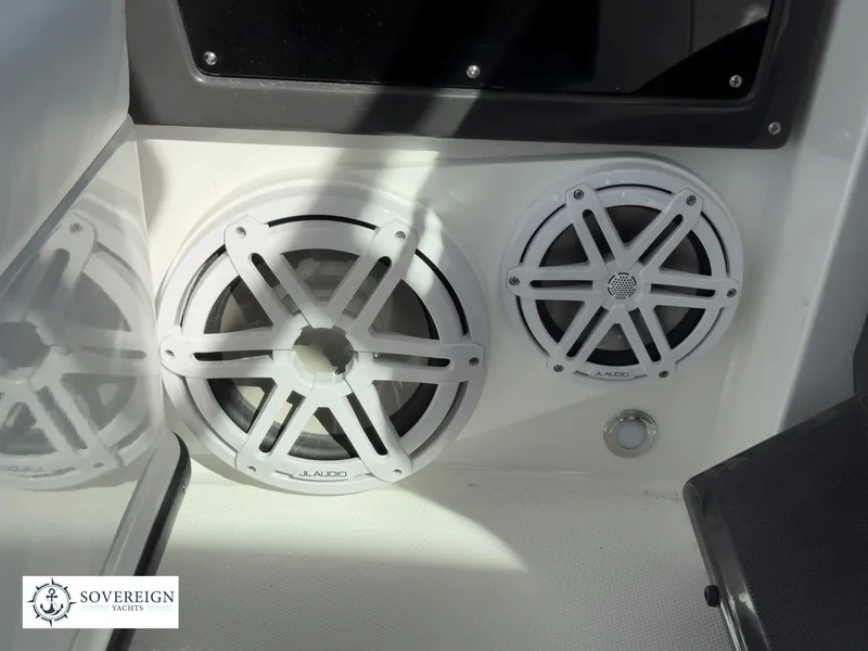 Slide: The Image of 2024 Blackfin 252 DC boat speakers and control panel. - 32