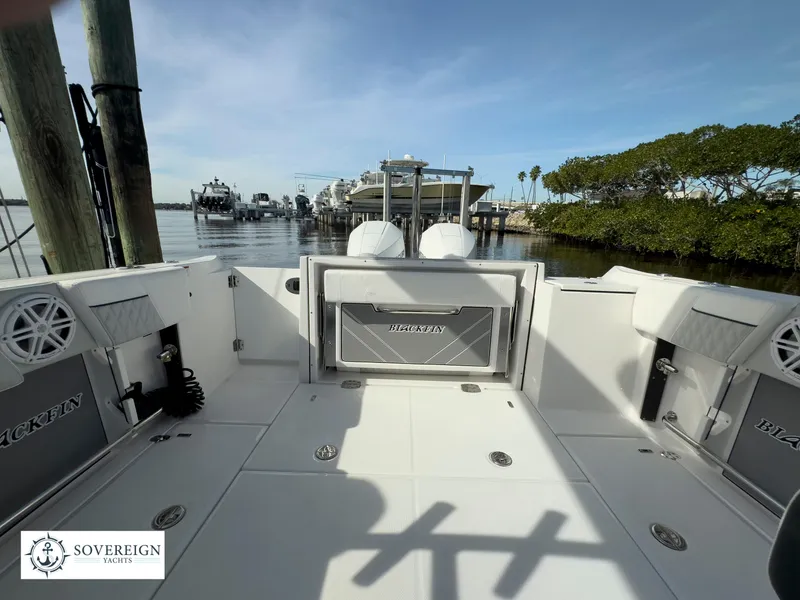 Slide: The Image of 2024 Blackfin 252 DC boat interior with waterfront view. - 43