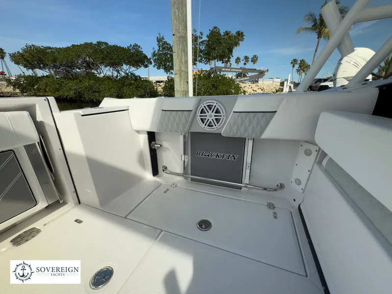 Slide: The Image of 2024 Blackfin 252 DC boat interior with Sovereign Yacht logo. - 44