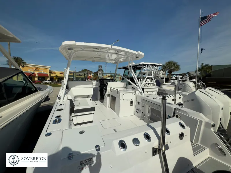 Slide: The Image of 2024 Blackfin 272 DC boat at Sovereign Yacht dealership. - 11