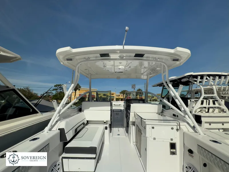Slide: The Image of 2024 Blackfin 272 DC boat interior with seating and helm station. - 12