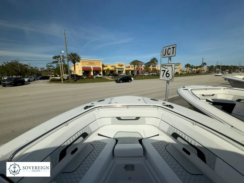 Slide: The Image of 2024 Blackfin 272 DC boat at Sovereign Yachts dealership near junction 76. - 16