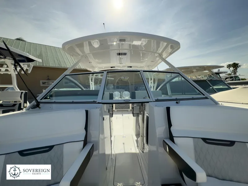 Slide: The Image of 2024 Blackfin 272 DC boat interior with Sovereign Yachts logo. - 17