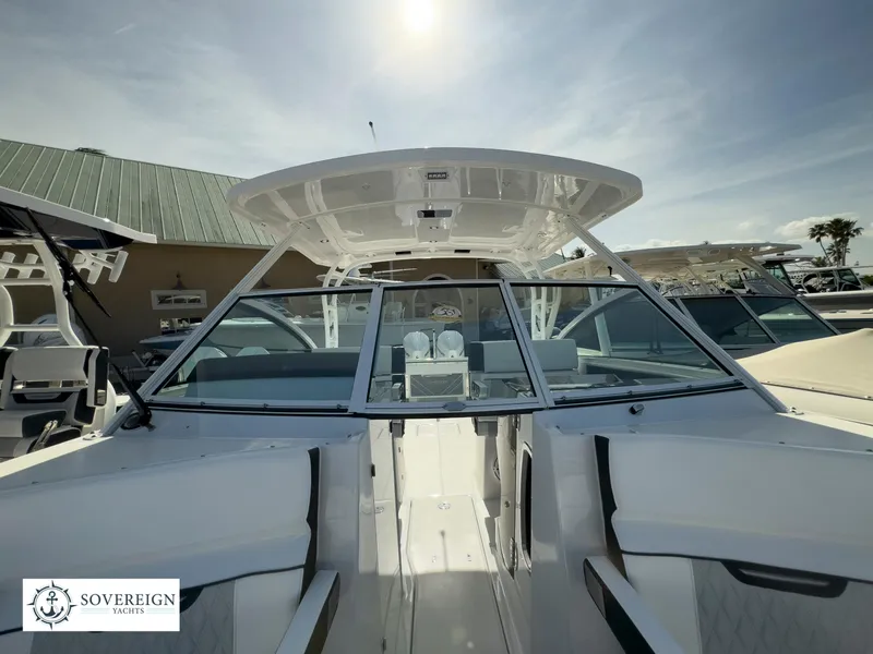Slide: The Image of 2024 Blackfin 272 DC boat at Sovereign Yacht dealership. - 18