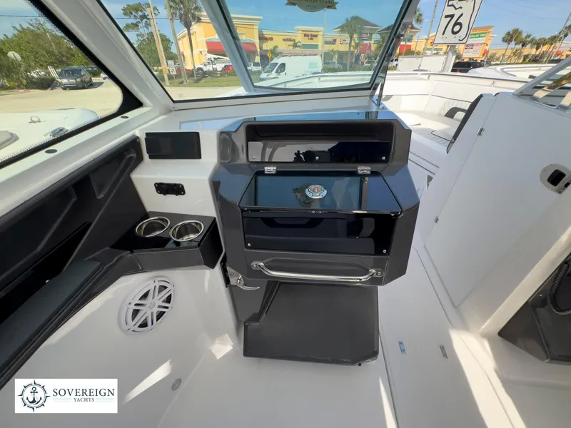 Slide: The Image of 2024 Blackfin 272 DC boat interior with dashboard and control panel. - 24