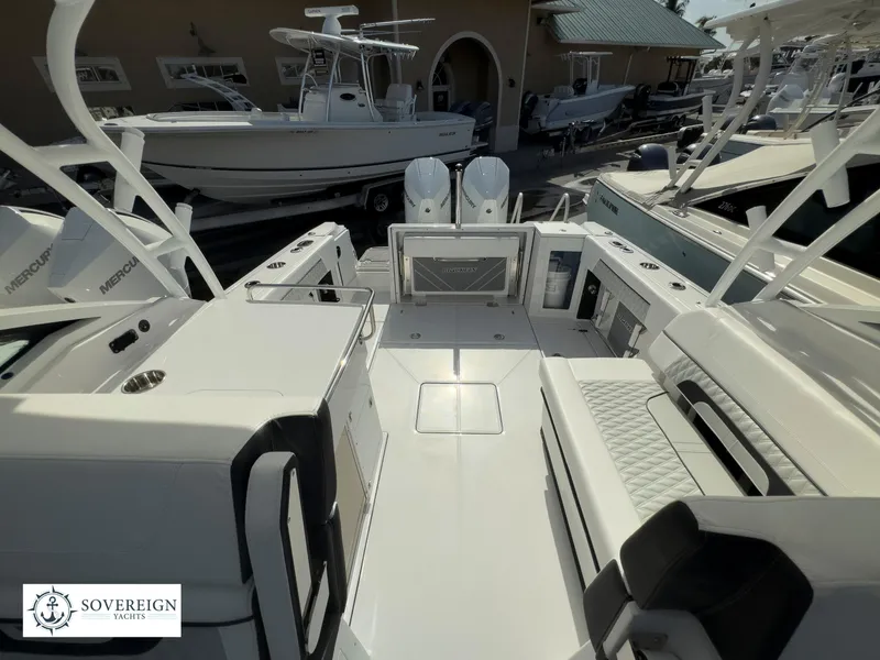 Slide: The Image of 2024 Blackfin 272 DC boat interior with spacious deck and modern amenities. - 40