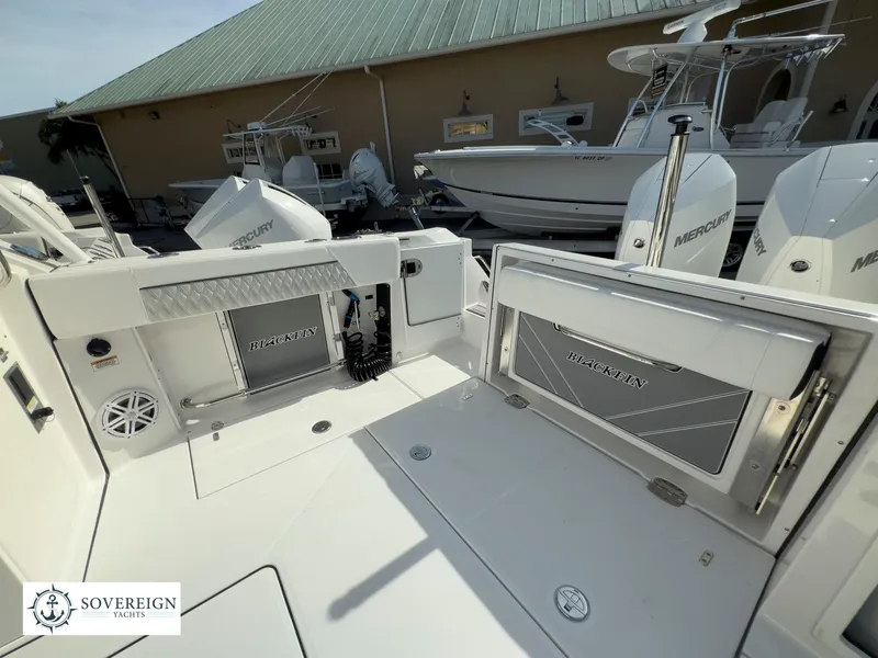 Slide: The Image of 2024 Blackfin 272 DC boat deck with Mercury engines at Sovereign Yachts. - 48