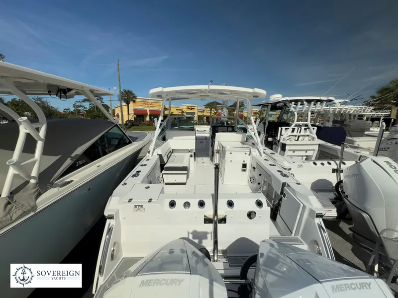 Slide: The Image of 2024 Blackfin 272 DC boat with twin Mercury engines at Sovereign Yacht. - 8