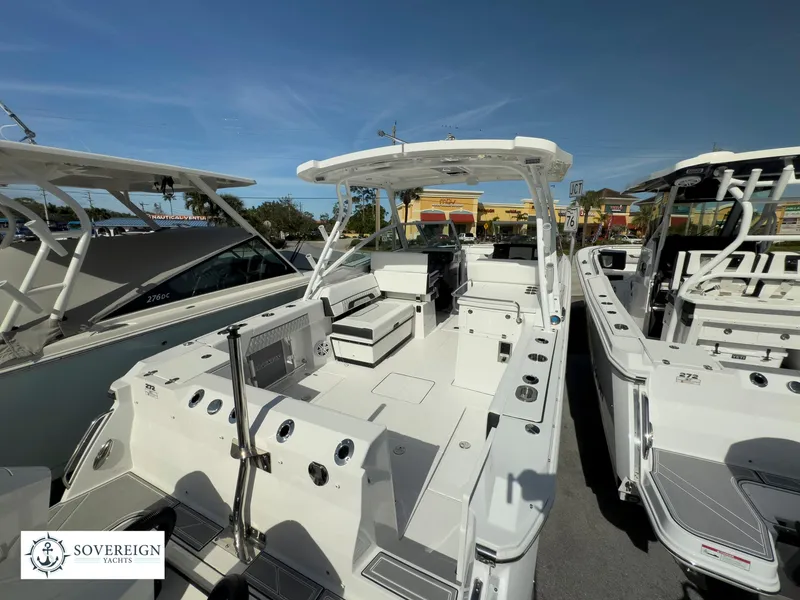 Slide: The Image of 2024 Blackfin 272 DC boat with spacious deck and modern amenities. - 9