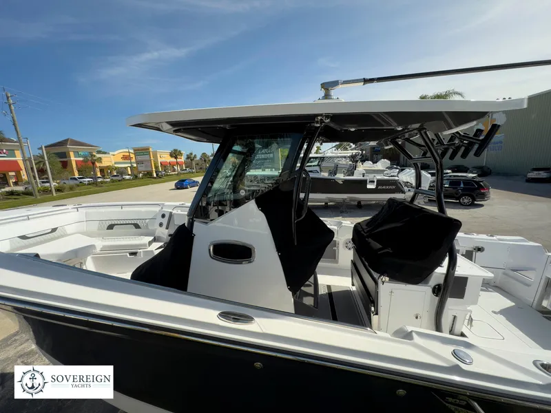 Slide: The Image of 2024 Blackfin 302 boat at Sovereign Yachts dealership. - 12