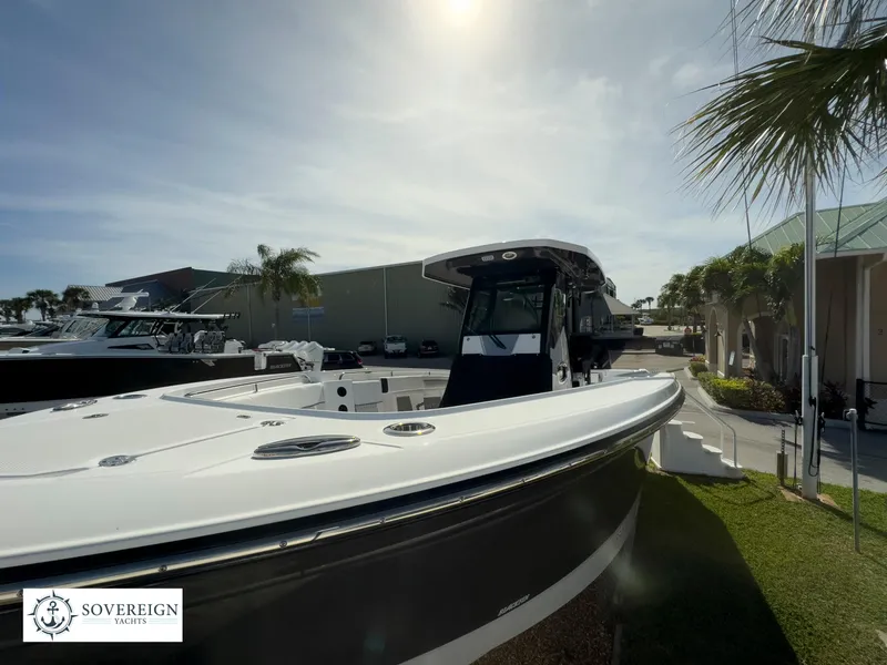 Slide: The Image of 2024 Blackfin 302 boat displayed at Sovereign Yacht dealership. - 3