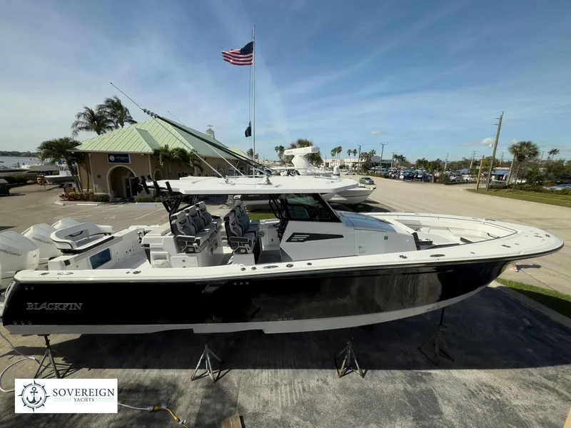 Slide: The Image of 2024 Blackfin 400 boat displayed at Sovereign Yacht dealership. - 12