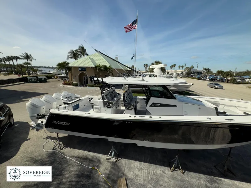 Slide: The Image of 2024 Blackfin 400 boat displayed at Sovereign Yacht dealership. - 13